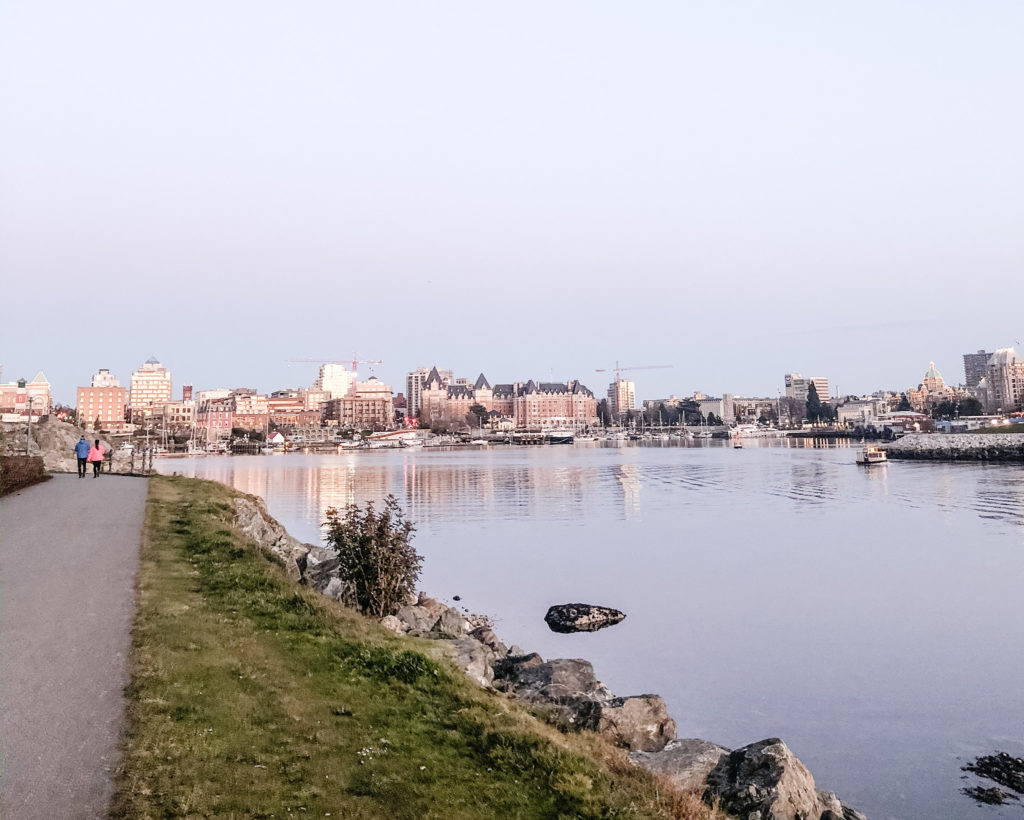 Water view and city view along the west song walkway in Victoria, BC