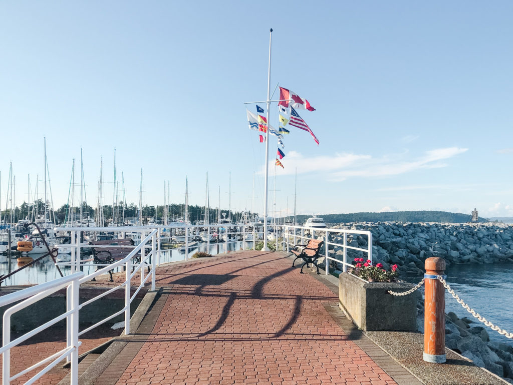 Sidney pier with sail boats and the ocean 